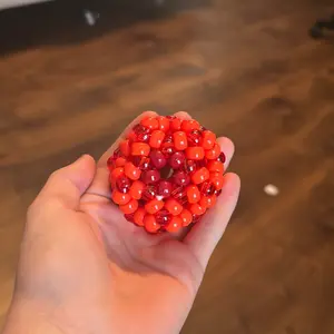 Kandi Stress Ball - Red Beaded Handheld Squeeze Toy for Anxiety Relief and Stress Management
