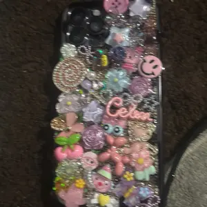 Junk Case - Decorated with Floral and Character Designs, featuring Glitter and Beads for a Unique Look
