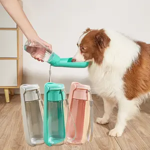 1 pet travel water bottle, 550ml/16.9oz capacity. Features a drinking trough, leak-proof portable hanging strap, perfect for outdoor walks and hiking with dogs. Available in multiple colors. Pet water dispenser, Drinking Water Bowl.