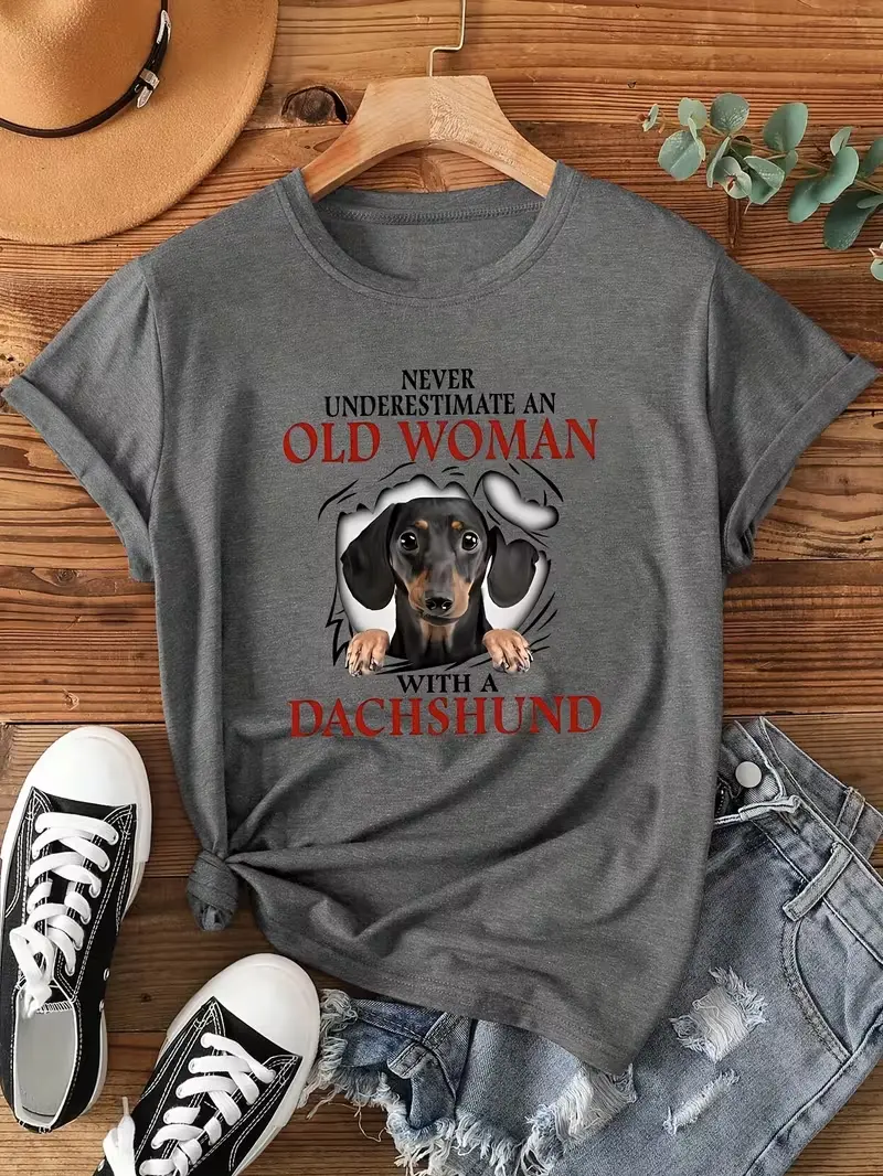 Women's Never Underestimate An Old Woman With A Dachshund Graphic T-Shirt, Wiener Dog Rip Fabric Print Crew Neck Short Sleeve Casual Pet Lover Top