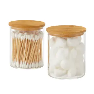 Glass Qtip Holder Dispenser with Bamboo Lid - 2 Pack Apothecary Jars - Cotton Balls Pads Swabs Holder Jar - Bathroom Vanity Canisters Jars for Countertop Storage and Organization Bottles Plastic