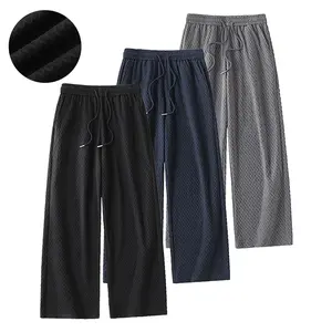 Men's jacquard textured drawstring waist long pants, lightweight, breathable and loose-fit training trousers, perfect for summer daily wear, fitness and running workouts.