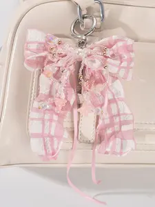 Sweet and fashionable pink and white checkered bow pendant, adorned with beads and bell orchids, featuring a niche design and retro personality, Fashion Bag Charms suitable for all kinds of bags, with a gentle and exquisite style, Purse Accessories Charm