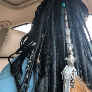 Black Crow Dreadlock Extensions with Beaded Decor and Feather Accents