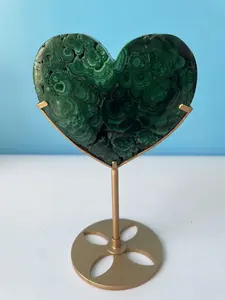 A heart-shaped decorative item made of malachite