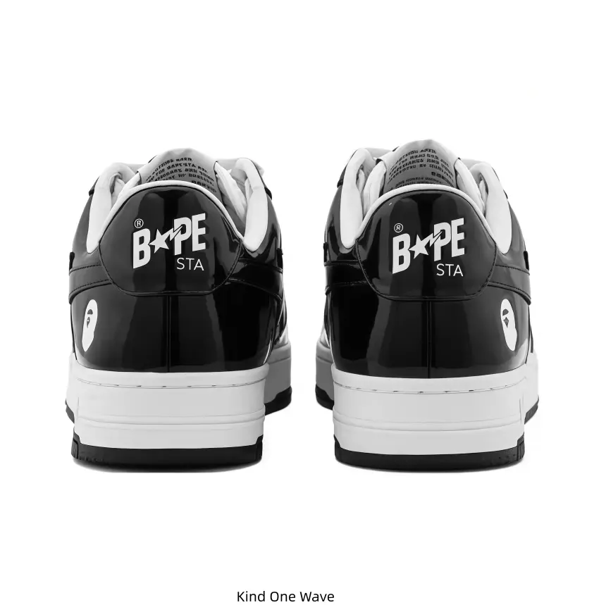 Glossy Black-and-White Color Block BAPE STA Low-Top Sneakers, Black Star Graphic on Side, Brand Lettering Printed on Heel Counter, White Midsole & Black Outsole, Classic Street Style Lace-Up Casual Footwear for Unisex Daily Outfit and Collection