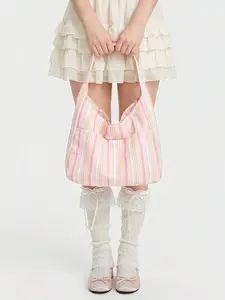 Fresh and artistic style simple casual versatile striped shoulder bag, contrasting vertical stripes, large capacity design, multiple pockets, wide shoulder strap design, suitable for commuting/campus/casual dressing scenes
