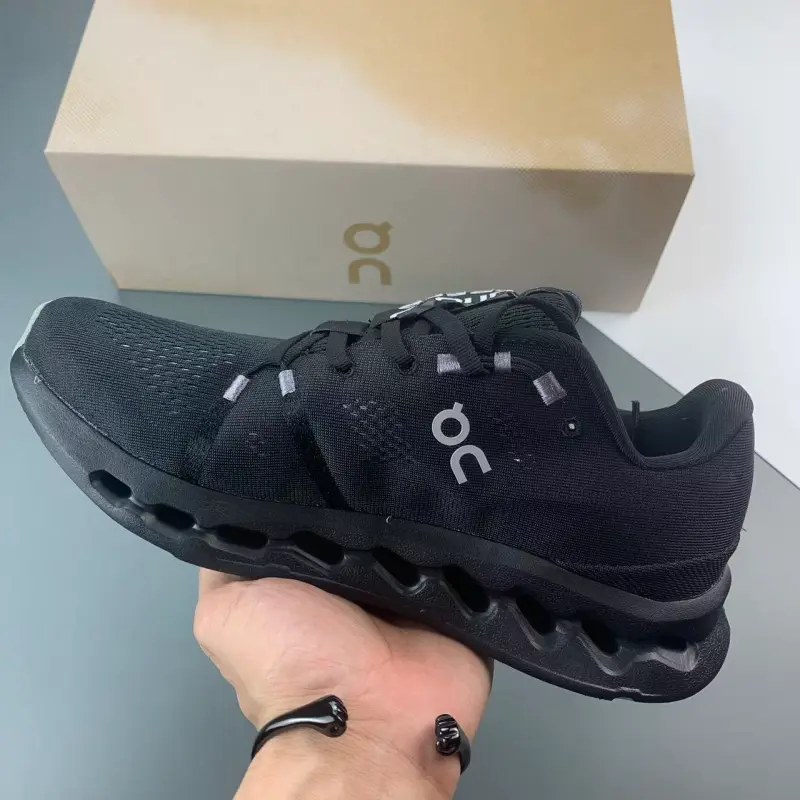 Performance street kicks that elevate every minimalist understated casual daily outfit, porous stretch knit mesh upper adopting monochromatic jet-black finish with wide roomy toe box, built-in mesh vent panels