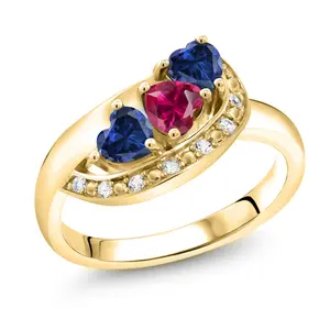 Gem Stone King 18K Yellow Gold Plated Silver Red Created Ruby Blue and White Created Sapphire Engagement Ring For Women (1.36 Cttw, Gemstone July Birthstone, Heart Shape 4MM)