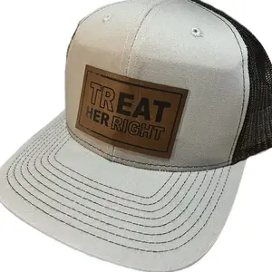 Gray and black treat her right leather patch trucker style