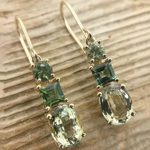 A pair of elegant green vintage geometric pendant earrings with synthetic zirconia, gold-plated copper, perfect for women's holiday parties and festive occasions, holiday jewelry| Vintage Geometric Design| Synthetic Zircon Decoration, Christmas Earrings