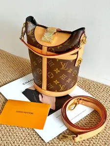 Pre-owned Louis Vuitton LV “French Fries” handbag — can be carried by hand, worn on one shoulder, or crossbody