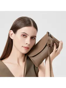 Fashion cowhide small bag messenger bag women's 2025 new shoulder bag bag niche versatile commuter mobile phone change bag Crossbody Leather Bag