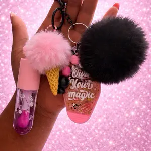 Junk Keychain with Lip Oil - Pink and Black Pom Poms, "Your Magic" Design, Perfect for Keychains and Accessories
