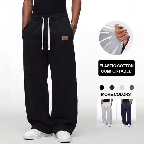 Black loose men’s sweatpants, extremely comfortable for everyday wear, skin-friendly men’s joggers, super comfortable with an elastic waistband, classic drawstring men’s casual sweatpants, suitable for various occasions, and perfect for wearing in spring