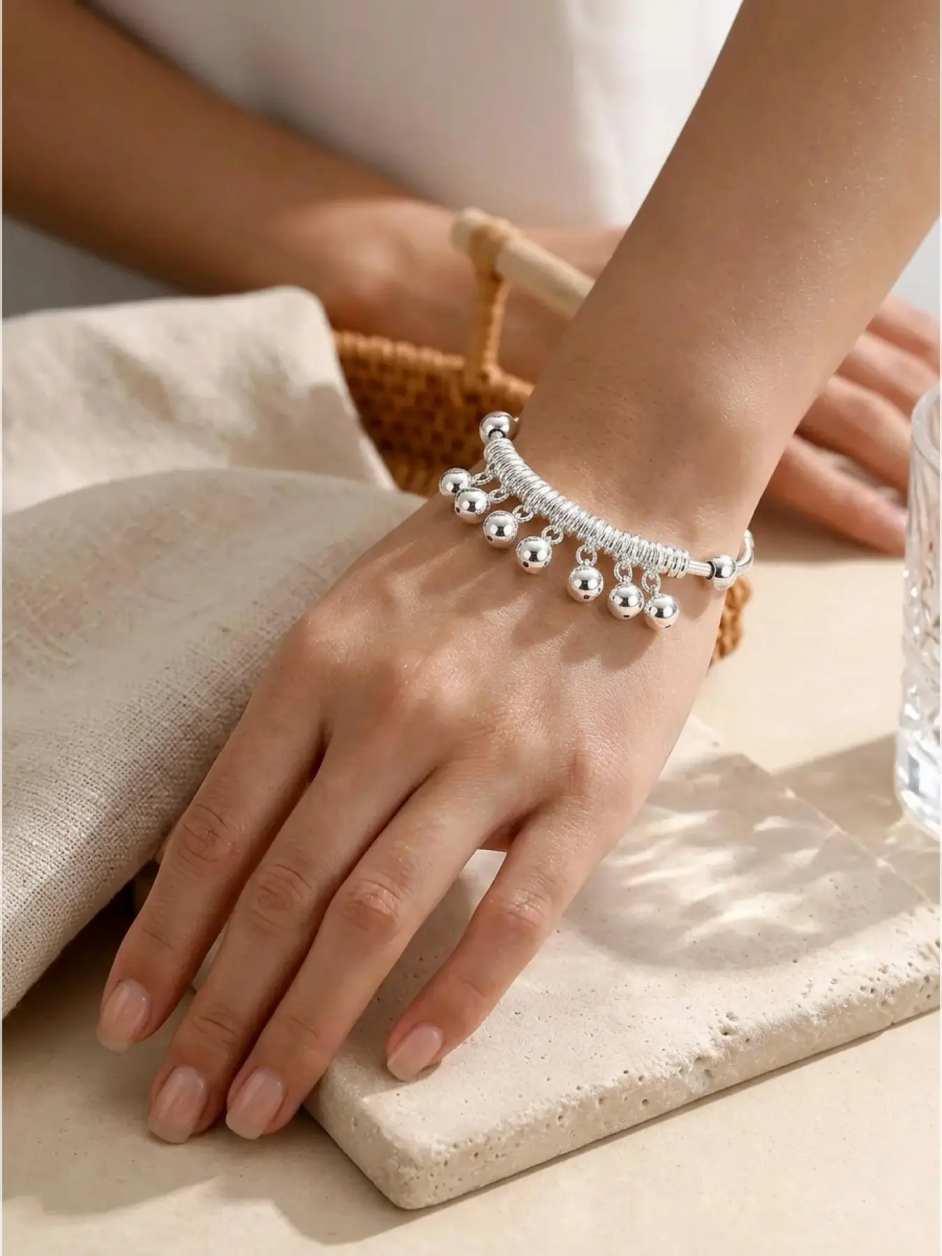 One Vintage Bell Bracelet an adjustable open-cuff bangle featuring dangling beaded pendants. Perfect for holidays, beach outings, and everyday wear, it makes an ideal birthday or Bohemian-style gift. Adjustable Bangles
