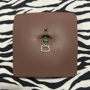 Green HK Belly Piercing