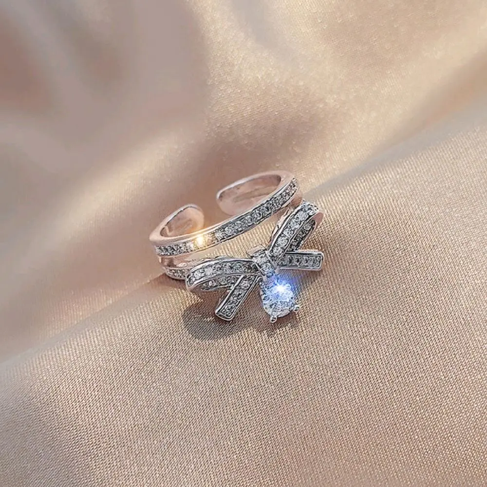 Silver Bow Tie Ring with Dangling Rhinestone Adjustable for All Sizing Elegant Jewelry Accessory