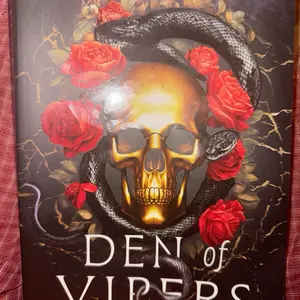 For Sell Books - Den of Vipers with Stunning Skull and Roses Design