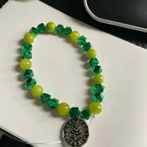Emerald Glow: Lime & Dark Green Beaded Bracelet with Charm for a Bold & Lucky Look