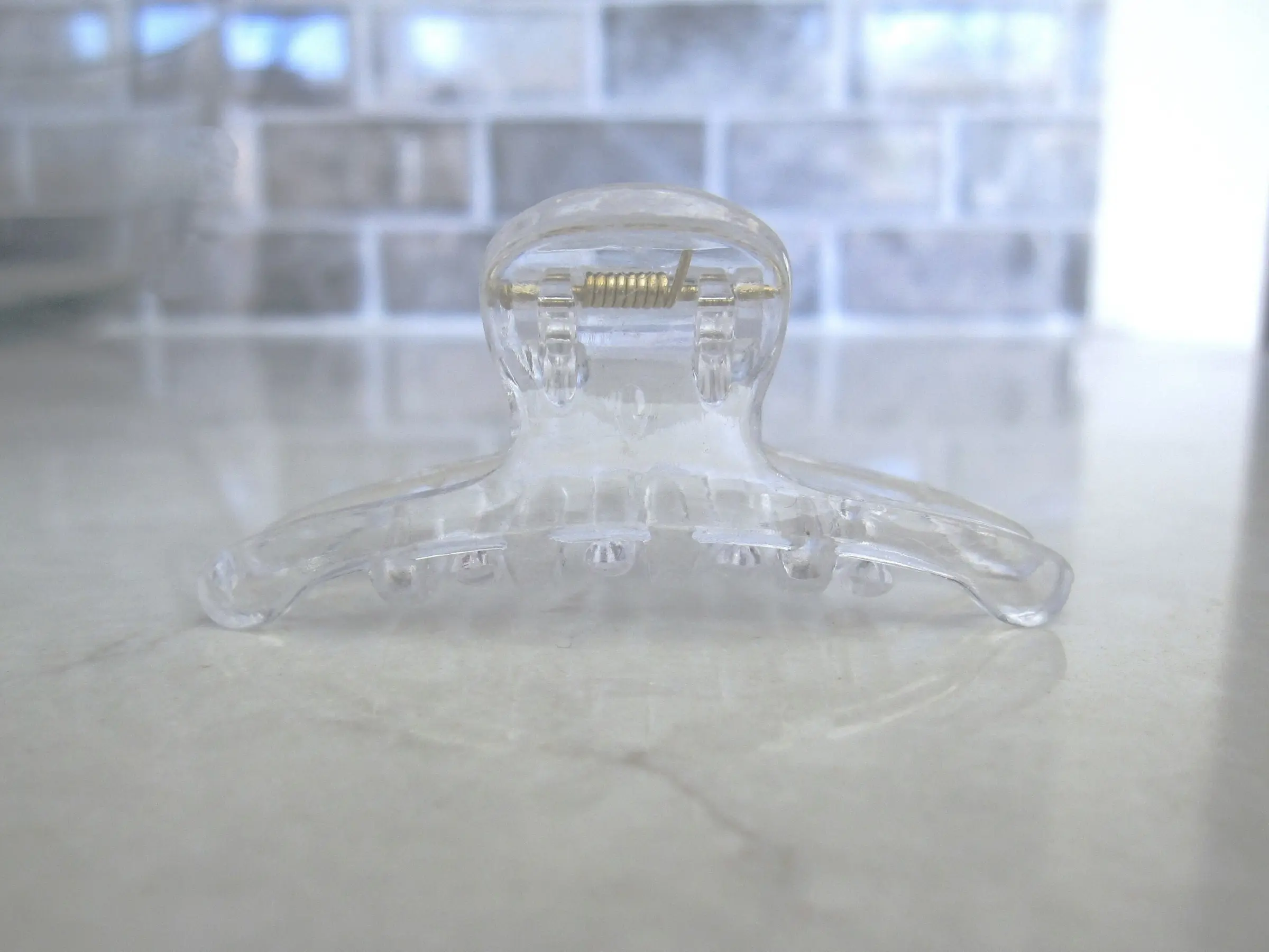 Small clear transparent no color hair claw clip for fine, thin hair