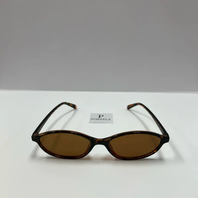 PHREELA Women's Oval Sunglasses 90s Style Leopard Design with Black Handles UV4000 Protection Stylish Fit