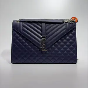 Pre-owned Yves Saint Laurent Italy Crossbody Bags YSL Black Envelope Bag Quilted Crossbody Design with Logo Accents