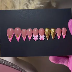 Beautiful Acrylic Stelleto Press On Nails with Pink Bow Gold Heart and Striped Design for Stylish Manicures. * Custom Handmade Press-On Nails - Made to Order (5-7 Business Days)