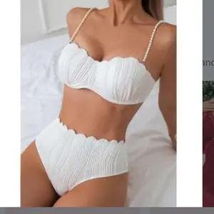 Sustainable bathing suit with handcrafted seashell design on the bra. Soft and comfy.