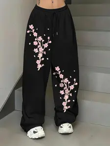 A pair of women's Spring casual trousers with an American-style retro elegant design, featuring a fun gothic dark and sweet-cool vibe, and a unique Japanese-style cherry blossom multi-patterned print wide-leg straight-leg pants