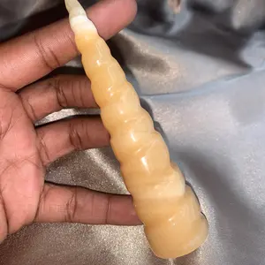 Natural Medium Orange Calcite Spiral Tower Unicorn Horn