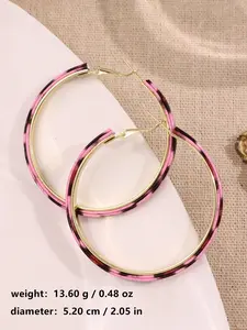 A pair of stylish, minimalist, and uniquely personalized pink leather earrings with leopard print texture and fringed large ears, suitable for wearing at parties and gatherings, women's jewelry