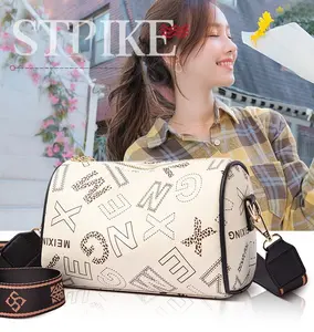 Vintage-Inspired Cylinder Crossbody Bag - Wide Adjustable Strap Classic Shoulder Purse with Timeless Appeal ﻿