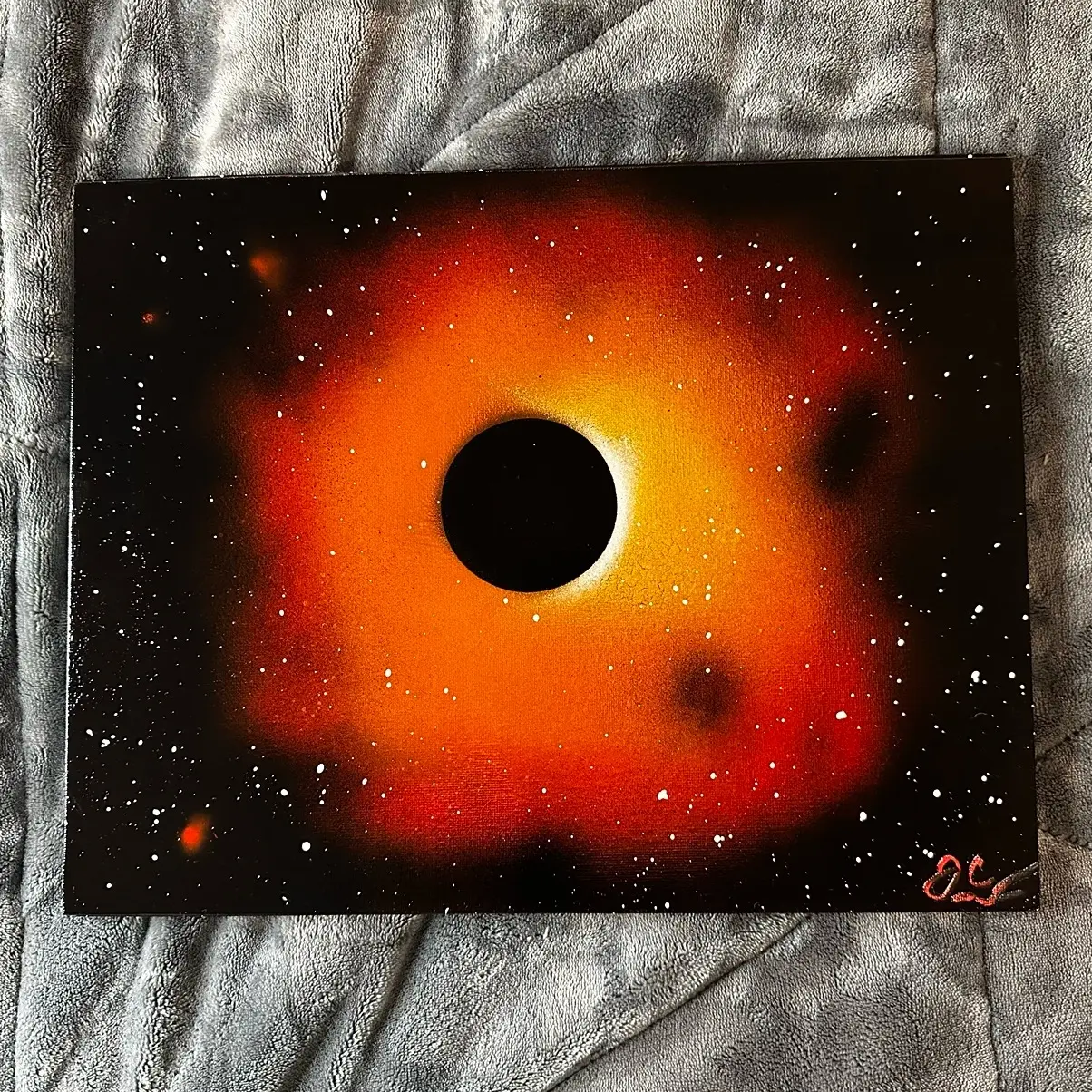 Orange and Red Black Hole Spray Paint Art - Perfect for Any Room