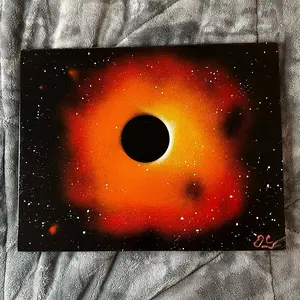 Orange and Red Black Hole Spray Paint Art - Perfect for Any Room
