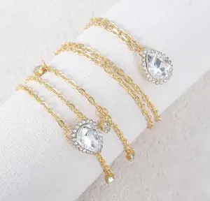 Stylish bridal body chain featuring zircon water droplet chest and back chain design. Light luxury European style shows unique charm and elegant temperament. Exquisite inlaid details shine brightly, perfect wedding accessories. Trendy and eye-catching