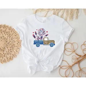 Women's 4th of July celebration with patriotic elements Graphic T-Shirt - Short Sleeve Crew Neck Regular Fit Casual Wear | Soft & Breathable Fabric, Durable Print, Everyday Comfort, Machine Washable, casual and festive flat lay product photography with