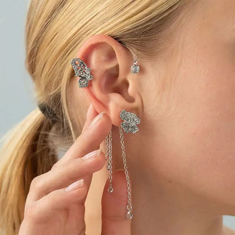 Butterfly tessud ears hanging silver rig