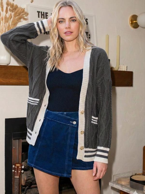 Preppy Cable Knit Varsity Cardigan  Textured cable knit cardigan with contrast varsity-inspired trim.