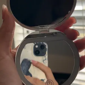 Product Review of Portable Foldable Makeup Mirror, 1 Count Glam Travel Makeup Mirror with LED Light, Compact Mirror for Women, Pocket Size Makeup Tools, Travel Hand Mirror from (**)