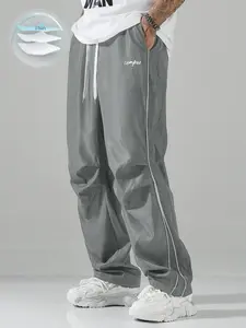 1 Pair Men's Lightweight Athletic Campus Cargo Pants with Side Stripes, Drawstring Waist and Minimalist University Style for Casual Streetwear and Daily Outings