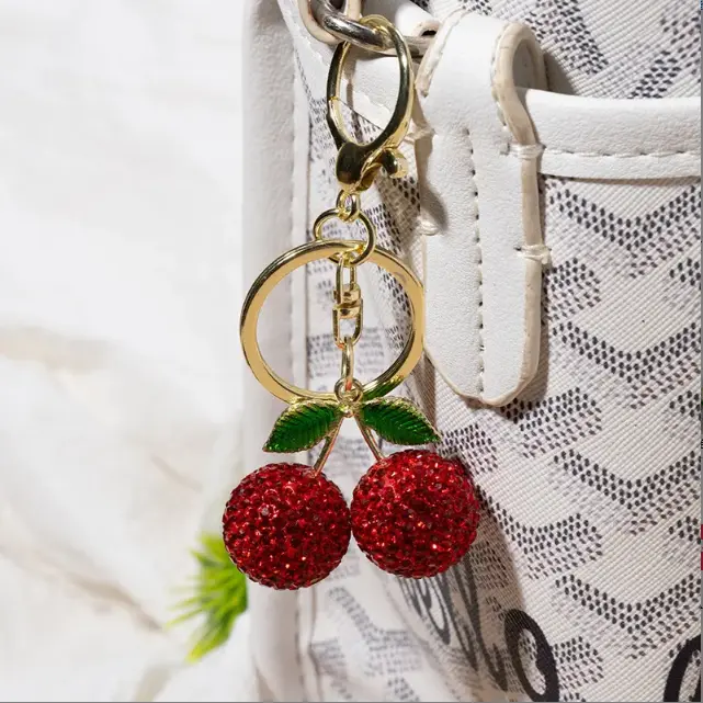 Cute cherry keychain inlaid with full diamonds, sparkly rhinestone bag charm, bling shiny crystal purse accessories, fashionable all-match pendant for women and girls, exquisite birthday party gift