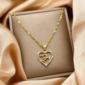 18k gold plated double heart shaped gold pendant necklace with fashionable CZ stones, perfect as a Valentine's Day gift or daily wear for women