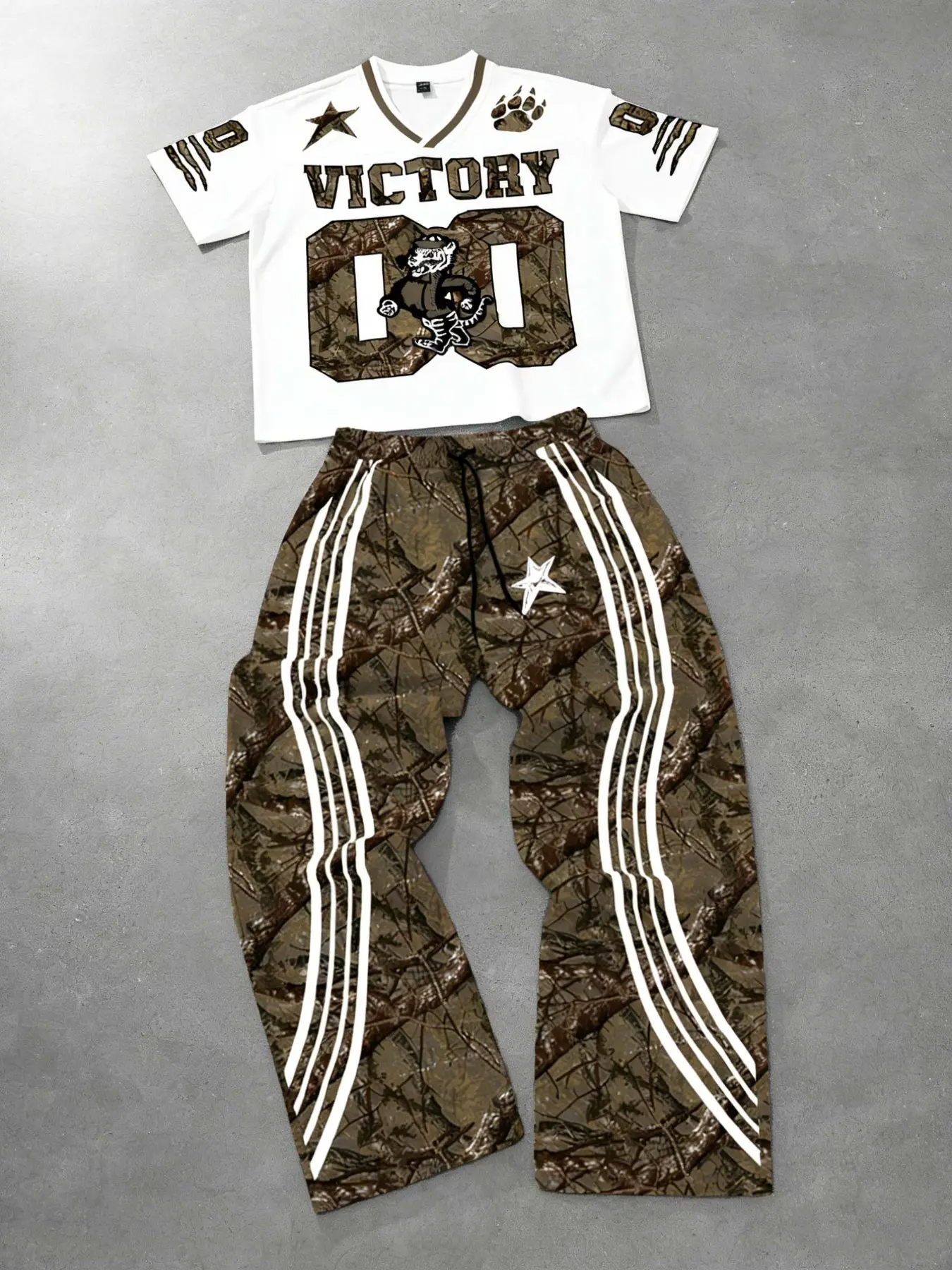 Men's Y2K Streetwear 2 Piece Camo Victory Football Set – Loose Fit Short Sleeve Jersey Top & Wide Leg Striped Pants, Camouflage Print Hip Hop Outfit, Baggy Trousers for Street Style, Casual Wear, and Summer Fashion