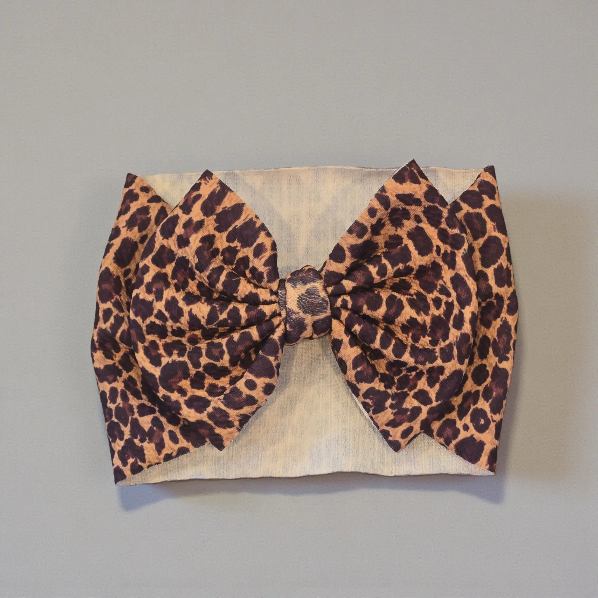 Leopard Print Bullet Fabric Hair Bow | Baby Headwrap, Nylon Headband & Piggie Bows | Trendy Cheetah Print Hair Accessories
