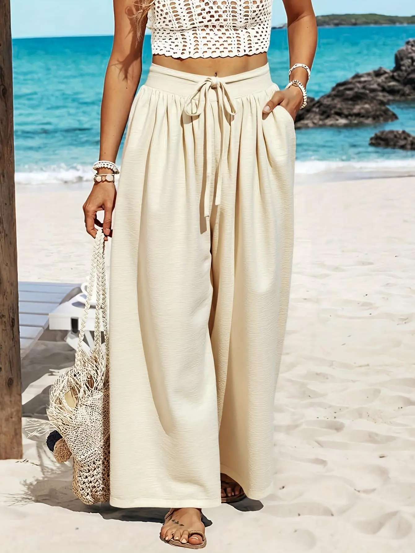 Women’s high-waisted drawstring wide-leg palazzo pants with side pockets—lightweight, breathable, loose, flowy casual trousers; bohemian beach vacation lounge summer wear