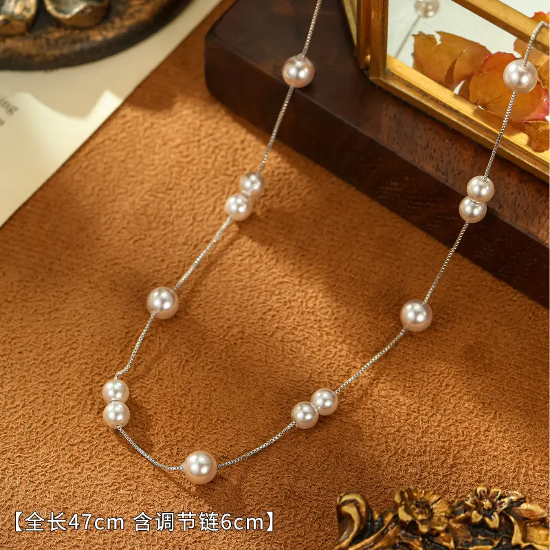 Silver beaded pearl necklace