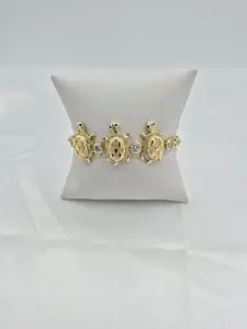 14K gold plated turtle bracelet. (93)