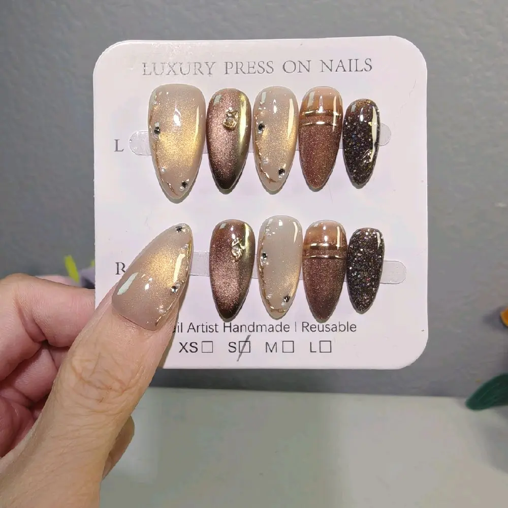 Handmade Nude Brown Gold Shimmer Cat Eye Press On Nails With Metal Accents, Glitter Gradient & Crystal Details, Medium Almond Reusable Fake Nails For Neutral Luxury Wear
