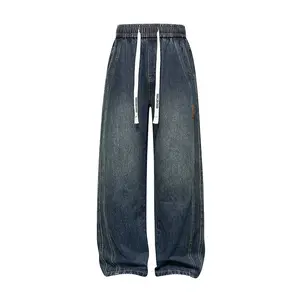 Men's casual street-style loose denim jeans, elastic waistband, straight-leg long pants, paired with a white drawstring